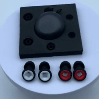 Black noise reduction earplugs with red accents on white background
Reusable earplugs with travel case for sports, concerts and everyday use
Ergonomic memory foam earplugs designed for comfort and clarity
High-fidelity earplugs for tailwind and traffic noise reduction while cycling