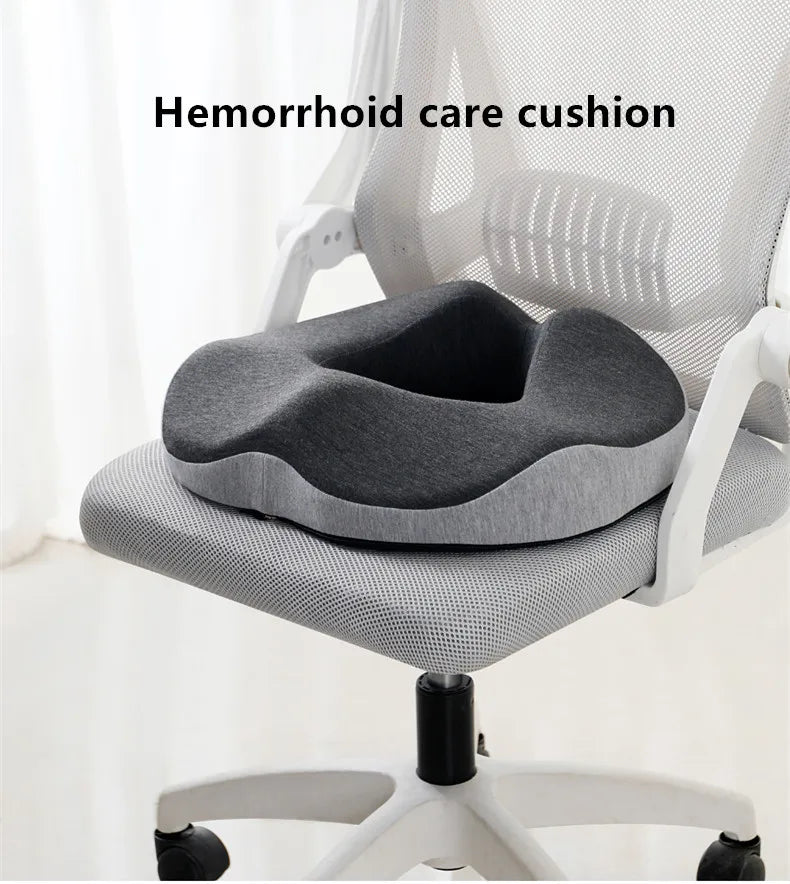 Gray hemorrhoid care cushion on a chair with text overlay