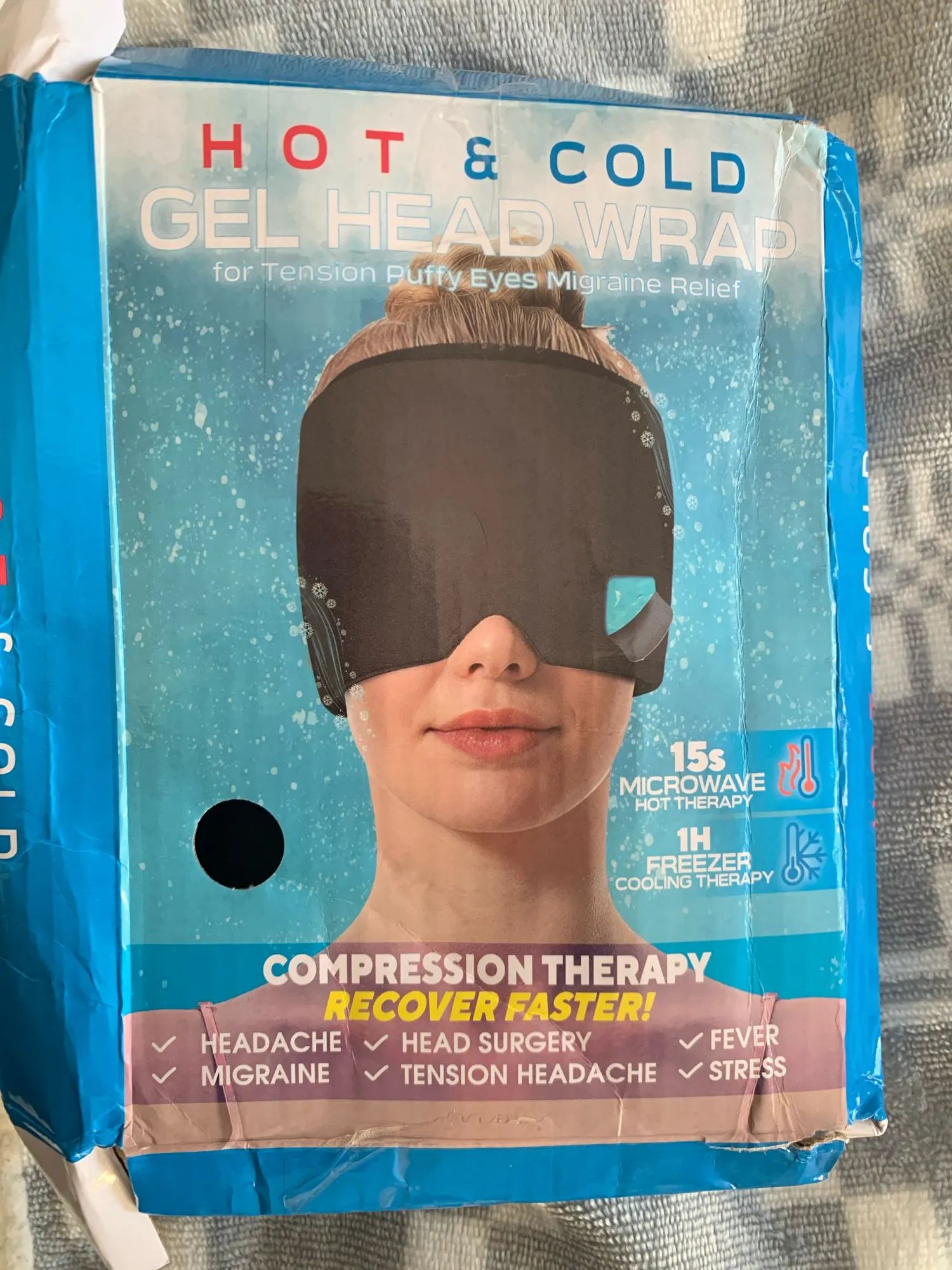Hot and cold gel head wrap packaging with a woman wearing the wrap on a textured surface.